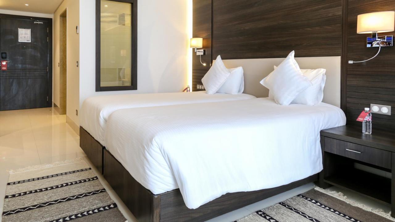 Radisson Hotel Sfax Exterior foto A bedroom at the hotel